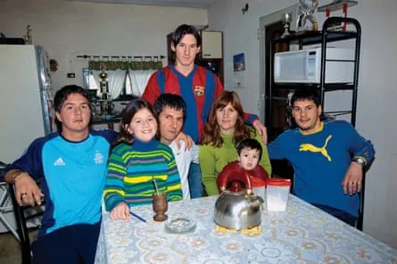 Lionel Messi poses with his brother Rodrigo, sister María Sol, father Jorge, mother Celia, nephew Tomás and brother Matías in Rosario, Argentina, in 2003