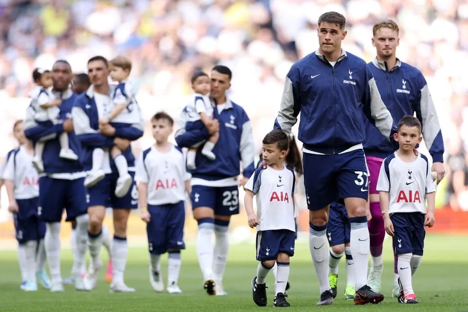 LONDON, ENGLAND - MAY 24: Micky van de Ven of Tottenham Hotspur walks out with mascots prior to the Premier League match between Tottenham Hotspur and Everton at Tottenham Hotspur Stadium on May 24, 2026 in London, England. (Photo by Richard Heathcote/Getty Images)